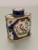 A Samson's of Paris 19thc Chinese style tea caddy decorated with exotic bird enclosed within gilt