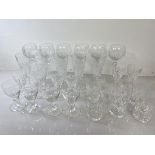 A collection of glasses including hock, porch, short tumblers and champagne flutes etc (a lot)