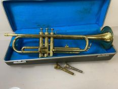 A Melody Maker trumpet, made in Taiwan, with hard case (49cm w)