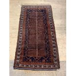 An Afghan Baluchi rug, of all over geometric design, 204cm x 98cm