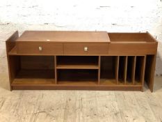 An unusual mid century teak hi-fi sideboard, the top with two drawers and a well, extending to the