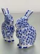 A pair of modern Chinese style blue and white seated bunny rabbits, (h 15cm x 8cm x 4cm)