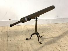 A 19th century brass table top telescope, stamped Peacock Auckland, on a folding tripod base,