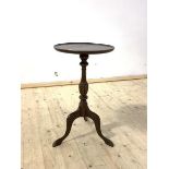 A Georgian style mahogany wine table on tripod base, H64cm, W38cm