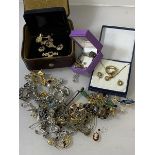 A quantity of costume jewellery, some silver, including earrings, necklaces, rings, brooches, fob,