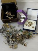 A quantity of costume jewellery, some silver, including earrings, necklaces, rings, brooches, fob,