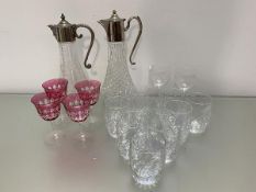 A quantity of glass including two claret jugs, (h 30cm), four cranberry glass wine glasses, ten