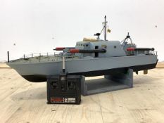 A Remote control model of a Perkasa class motor torpedo boat, on a stand, H41cm, L93cm