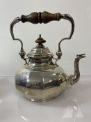 A Carringtons & Co silver kettle, London 1911, initials to one side, (h 24cm) weighs approximately