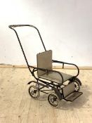 An early 20th century folding pram, with makers badge inscribed Walker W51cm