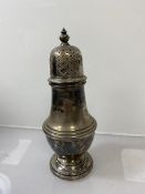 A silver sugar caster, Birmingham 1983, (h 14.5cm) weighs 102 grammes