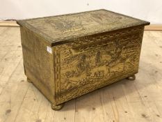 An early 20th century hammered brass coal box, the top and front depicting sea faring scenes, with