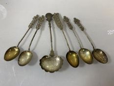 A collect of white metal spoons including Indian spoon with a two Annas coin, dated 1916, (13cm),