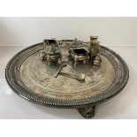 A quantity of Epns including footed circular salver, (d 31cm) and two condiment pots, salts and