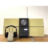 A Bang & Olufsen BeoSound Century sound system, with integrated speakers, CD player, radio and