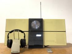 A Bang & Olufsen BeoSound Century sound system, with integrated speakers, CD player, radio and