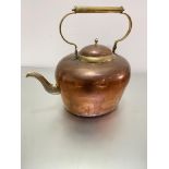 An over-sized copper brass-mounted kettle, with looped handle to top, (h 43cm x 44cm including spout