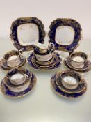 An Aynsley china blue and gilt tea service of 23-pieces, one tea cup a/f