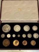 A specimen George VI United Kingdom coin set in original tooled gilt leather presentation box, dated