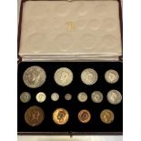 A specimen George VI United Kingdom coin set in original tooled gilt leather presentation box, dated