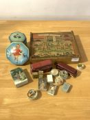 A mixed lot to include; a Dinky luxury coach model; a Corgi Routmaster coach model; tins; painted