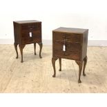 A Pair of early 20th century mahogany bedside chests, each fitted with three drawers, raised on