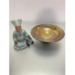 An Eastern brass and chased circular fruit dish, (h 8cm x d 27cm) and a Chinese celadon pottery