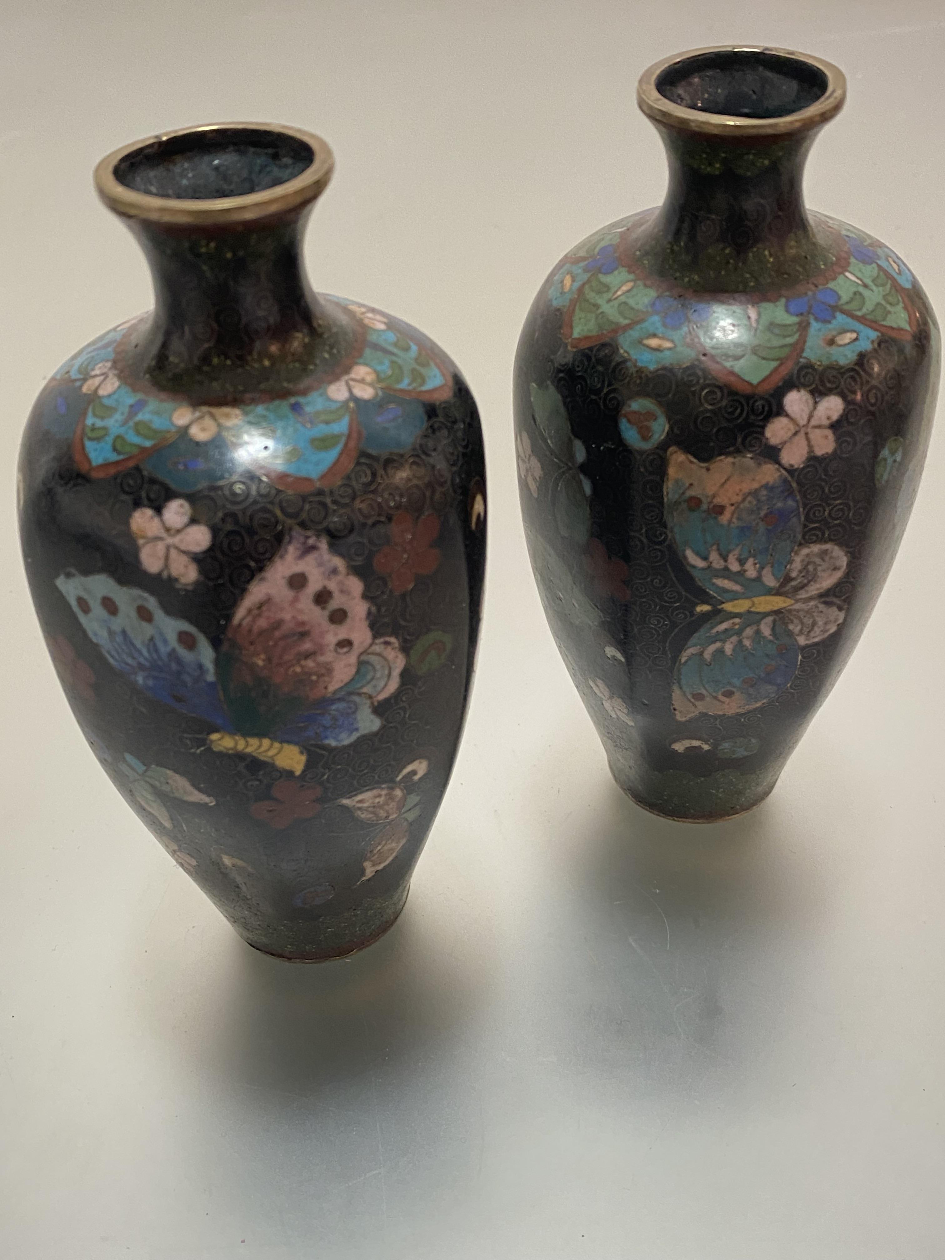 A pair of miniature Chinese cloisonne baluster octagonal vases decorated with butterfly design, (h
