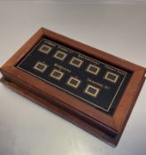 An Edwardian mahogany butler's room bell pull indicator with glazed eglomise panel including lounge,
