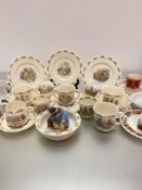 A collection of children's Bunnykins Royal Doulton pottery including four plates, four feeding