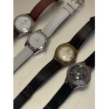 A collection of watches including a Revel quartz watch on leather strap, a Secret Dreams watch on