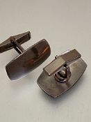 A pair of plain shaped Danish white metal sleeve links, signed Jensen, (L 2.5cm x 1.5cm) weigh 8.6