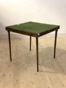 An early 20th century stained pine card table, with baize lined top over four folding square tapered