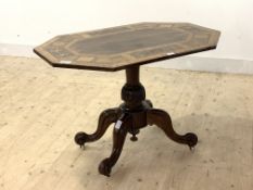 A Victorian rosewood and walnut and satinwood octagonal inlaid centre table, raised on a turned