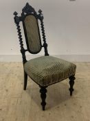 A Victorian Ebony side chair, the scrolled and acanthus leaf carved crest rail over upholstered