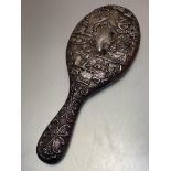 An unusual Victorian Birmingham silver dressing table hand mirror with stylised willow pattern