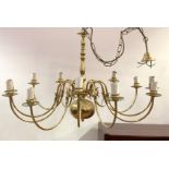 A Dutch style brass chandelier, the central baluster column issuing twelve branches, D94cm