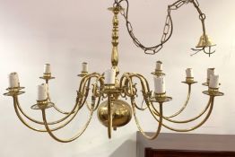 A Dutch style brass chandelier, the central baluster column issuing twelve branches, D94cm