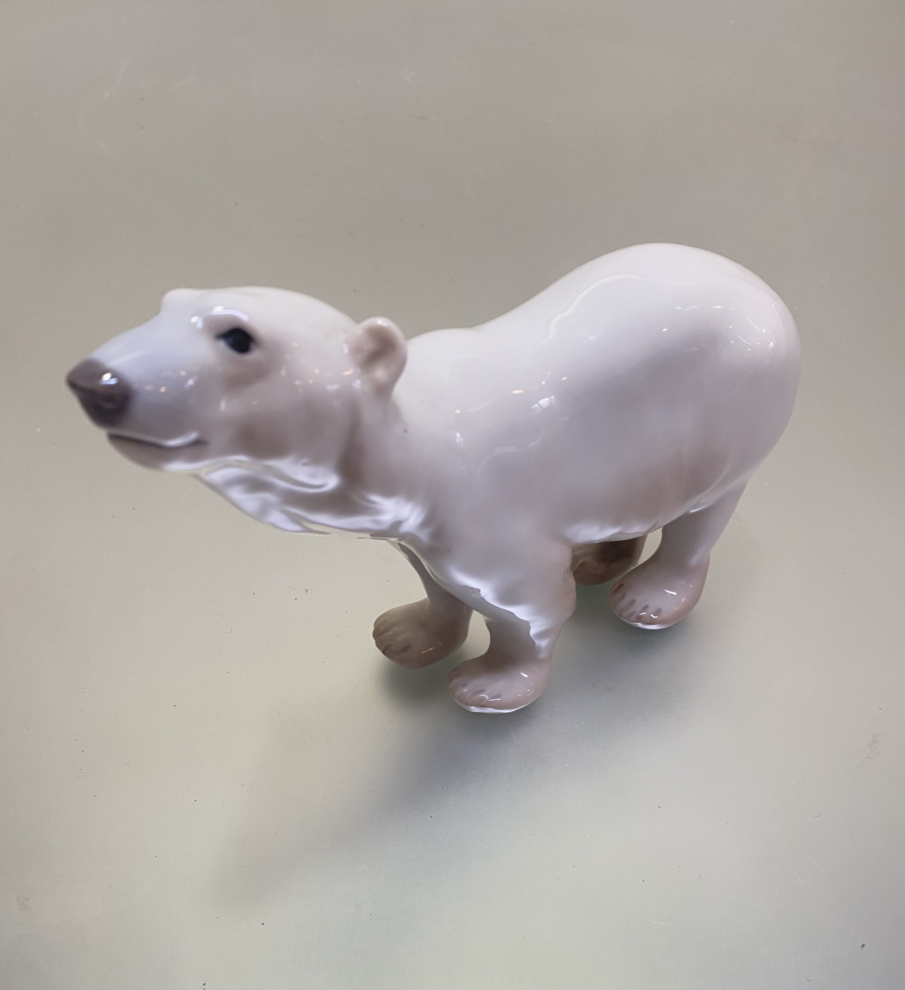 A Bing and Grondahl Danish Porcelain standing polar bear figure, (h 13cm x 19cm x 5cm)