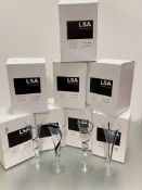 A group of 32 Black Jazz LSA International champagne flutes, various designs (h24cm)