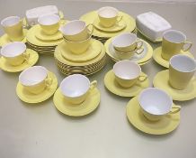 A Gaydon Melmex yellow mid-century melamine part tea, coffee, breakfast and dinner service,