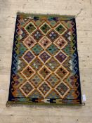 A Chobi Kilim rug of typical geometric design, 126cm x 87cm