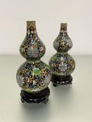 A pair of modern Chinese Jingfa gourd shaped cloisonne vases decorated with chrysanthemum design,