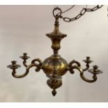 A Large Dutch style brass chandelier, the central column of gadrooned baluster form issuing six