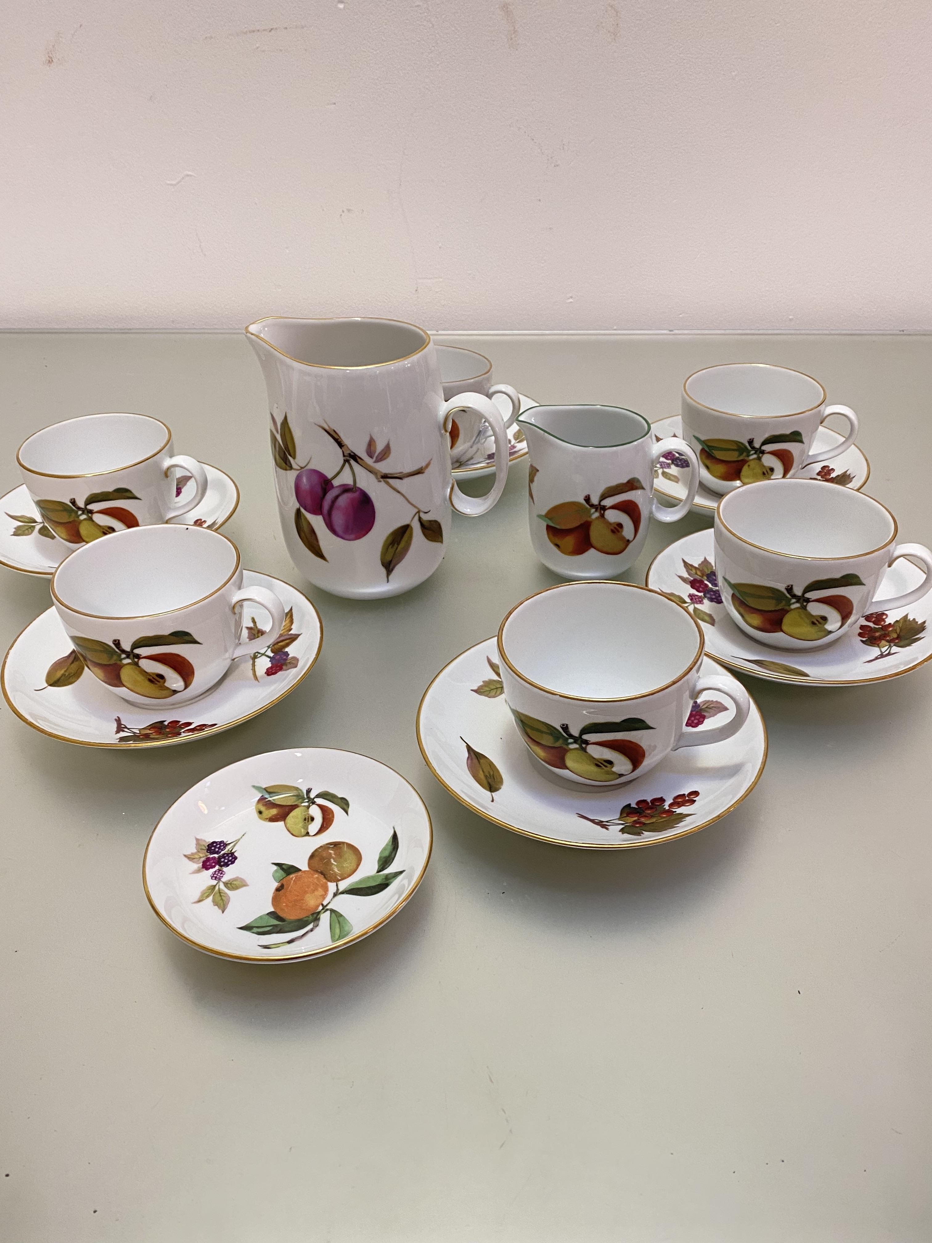 A Royal Worcester Evesham oven to tableware set of six teacups and saucers, a large milk jug, a