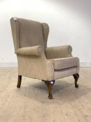 A Georgian style upholstered wing chair, first half of the 20th century, H100cm, W80cm. D78cm