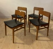 A set of four mid century teak dining chairs with vinyl upholstered seat and back, H77cm, W48cm,