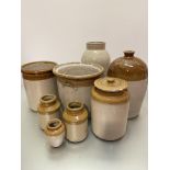 A group of stoneware kitchen items including a George Hare & Son Edinburgh flagon, a stoneware