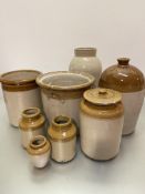 A group of stoneware kitchen items including a George Hare & Son Edinburgh flagon, a stoneware