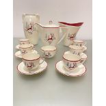 A Crown Devon Stockholm pattern leaping reindeer, 14-piece coffee set and matching two handled